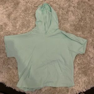 Aqua sweater shirt sleeve.